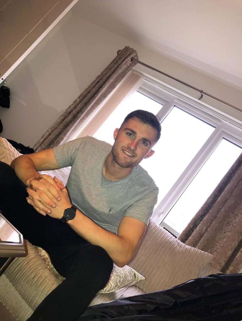 JJ Monaghan on the wrist of Hearts and Scotland player John Souttar